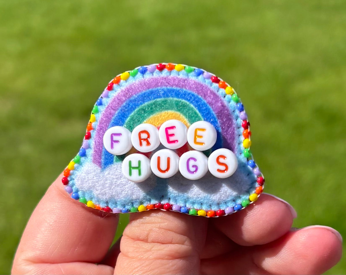 Free Hugs Rainbow Pin