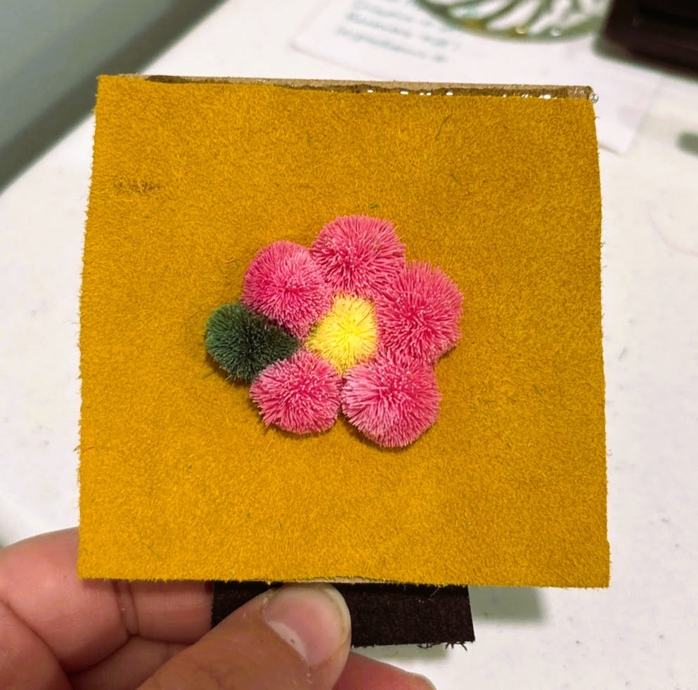 Handmade Caribou Hair Tufting Flower in Frame